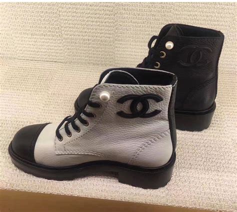 chanel boots on sale|Chanel black canvas heel boots.